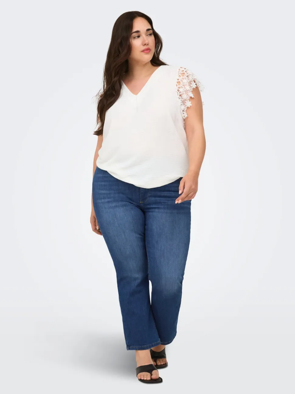 CARKENYA Średnia talia Krój flared Do kostek Jeans